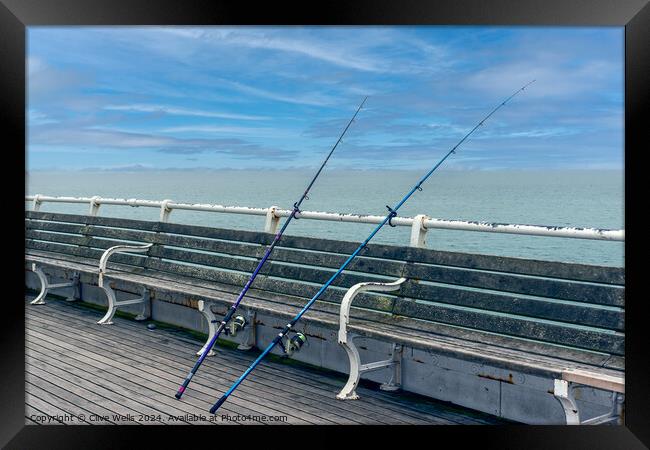 Fishing on the pier, Framed Print by Clive Wells