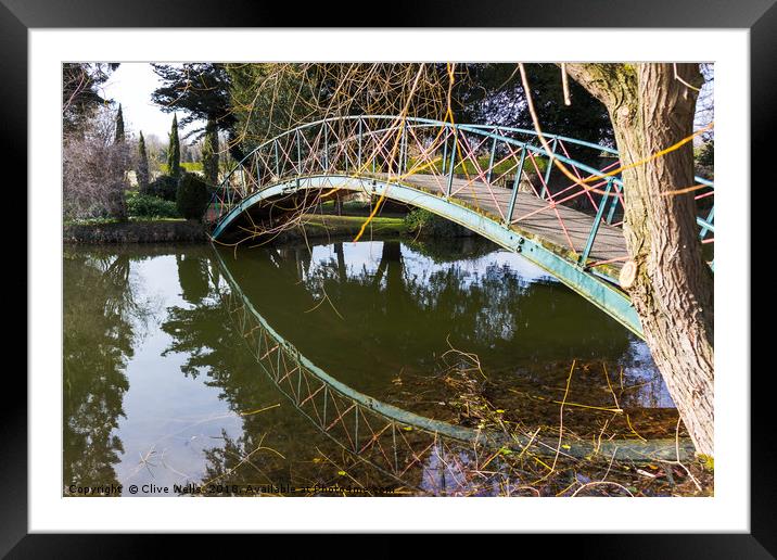 Footbridge with reflection. Framed Mounted Print by Clive Wells