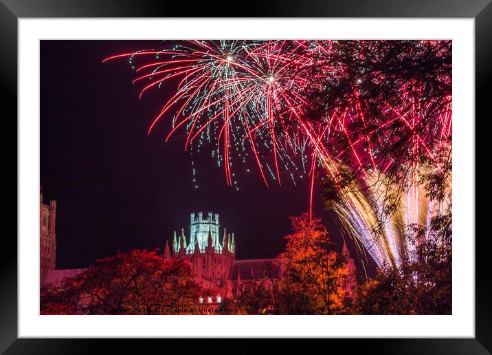 Lights in the sky over the City of Ely Framed Mounted Print by Clive Wells
