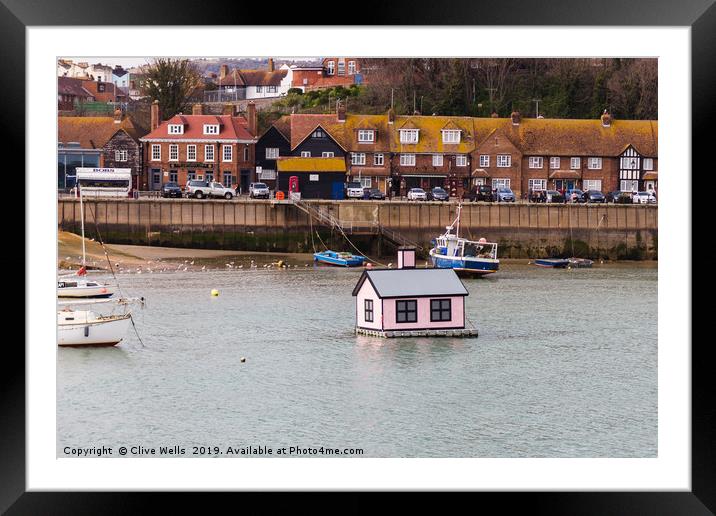 Floating house in Folkestone Harbour in Kent Framed Mounted Print by Clive Wells
