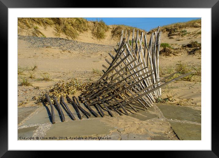 Fence in the dunes Framed Mounted Print by Clive Wells
