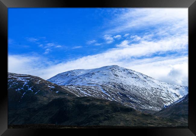 Blue sky and snow Framed Print by Clive Wells