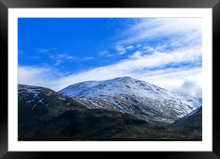 Blue sky and snow Framed Mounted Print by Clive Wells
