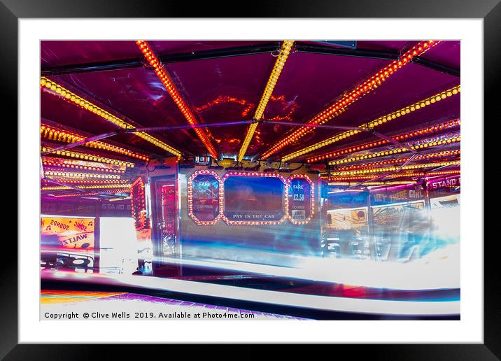 The Waltzer fairgrown ride at Kings Lynn, Norfolk Framed Mounted Print by Clive Wells