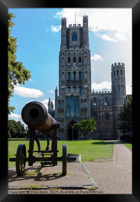 Cannon andCathedral seen in Ely, Cambridgeshire  Framed Print by Clive Wells