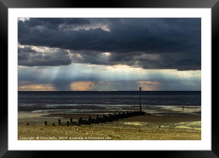 Dark skies over the Wash at Hunstanton Framed Mounted Print by Clive Wells