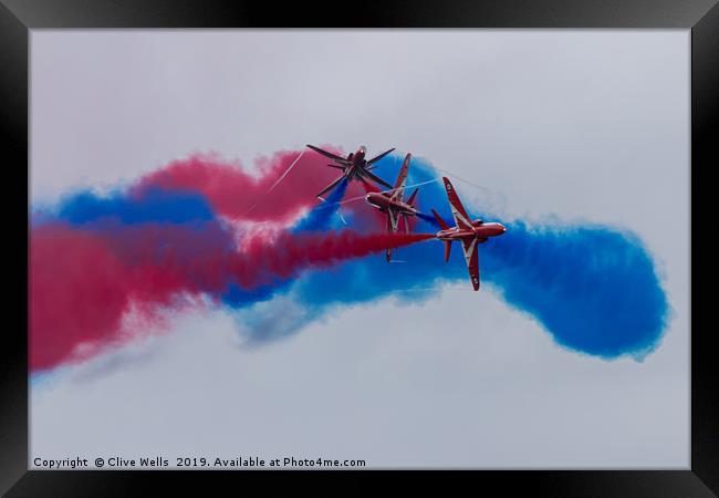 The Red Arrows seen at RAF Fairford Framed Print by Clive Wells