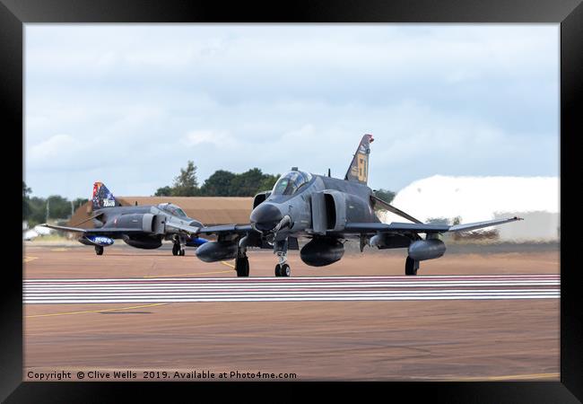 Both F-4E phantoms about to depart RAF Fairford Framed Print by Clive Wells