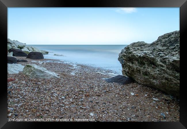 Long Exsposure of sea and rocks at Hunstanton, Nor Framed Print by Clive Wells