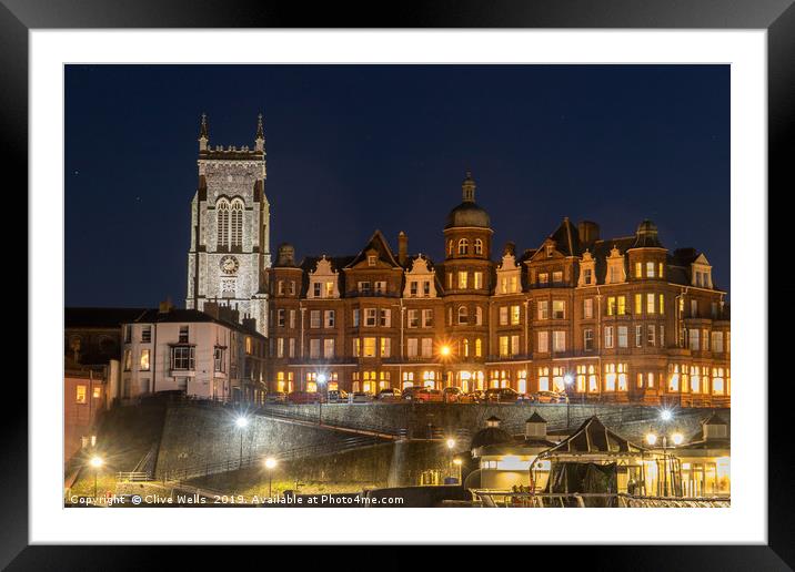 Cromer from the pier by night in Norfolk Framed Mounted Print by Clive Wells