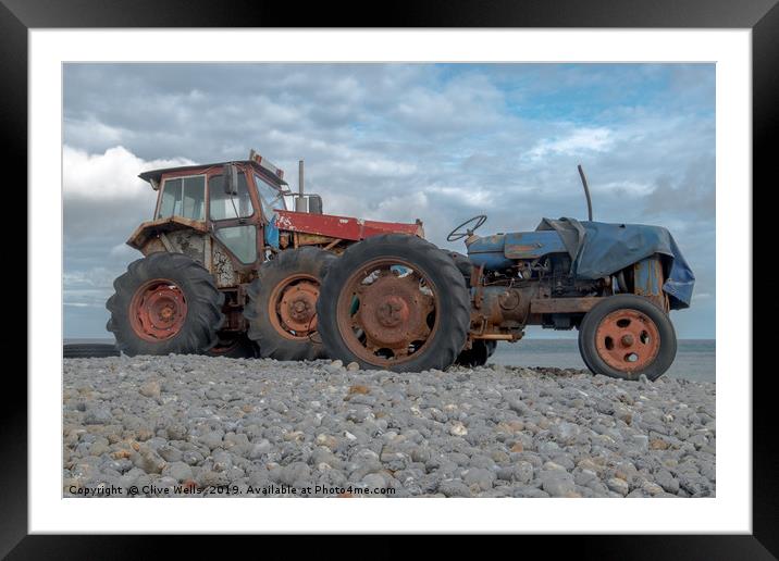 Tractors at Cromer in North Norfolk Framed Mounted Print by Clive Wells