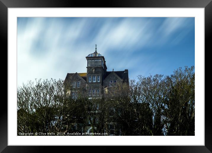 Strange house on the hill at Folksetone Framed Mounted Print by Clive Wells