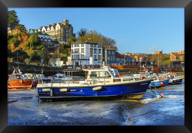 Boats at low tide at Folkestone Harbour, Kent Framed Print by Clive Wells