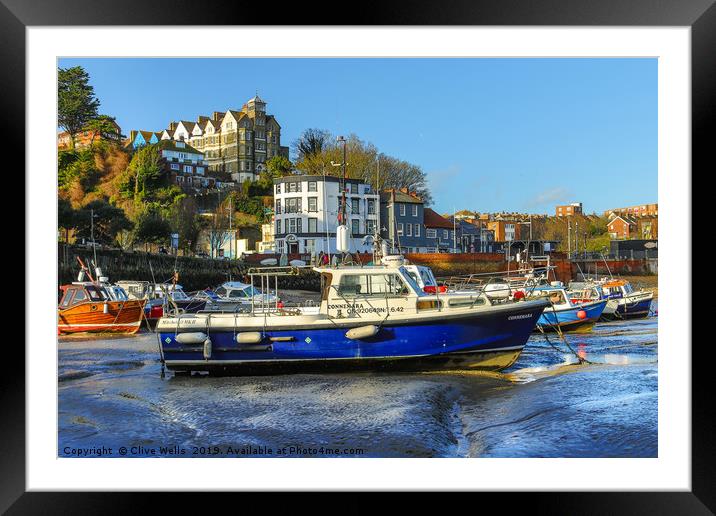 Boats at low tide at Folkestone Harbour, Kent Framed Mounted Print by Clive Wells