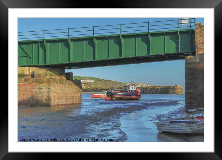View under the railway bridge at Folkestone Harbou Framed Mounted Print by Clive Wells