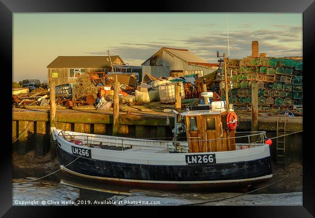Fishing boat at Brancaster Staith in Norfolk Framed Print by Clive Wells