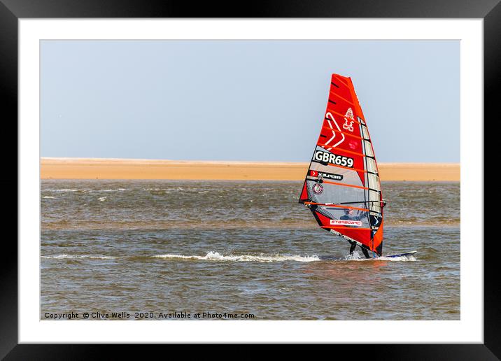 Wind surfing at Wells-Next-Sea in North Norfolk  Framed Mounted Print by Clive Wells