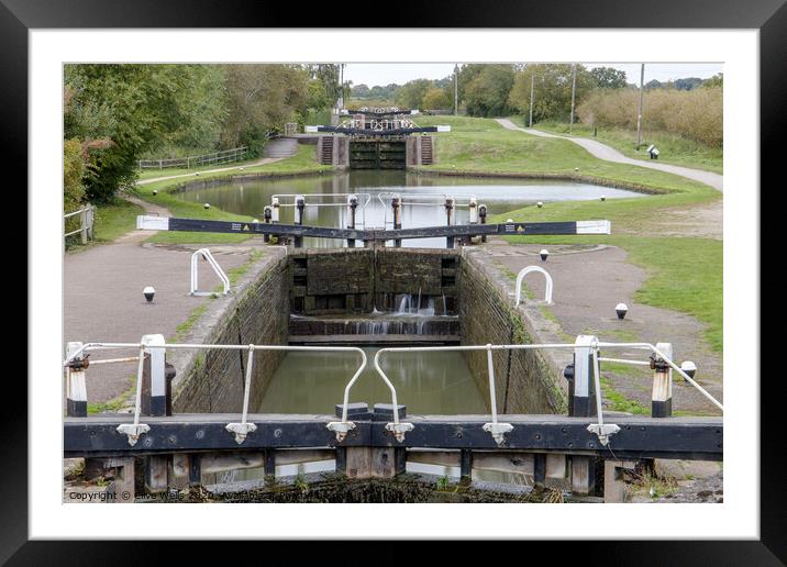 Row of lock gates at Stoke Bruene, Northamptonshir Framed Mounted Print by Clive Wells