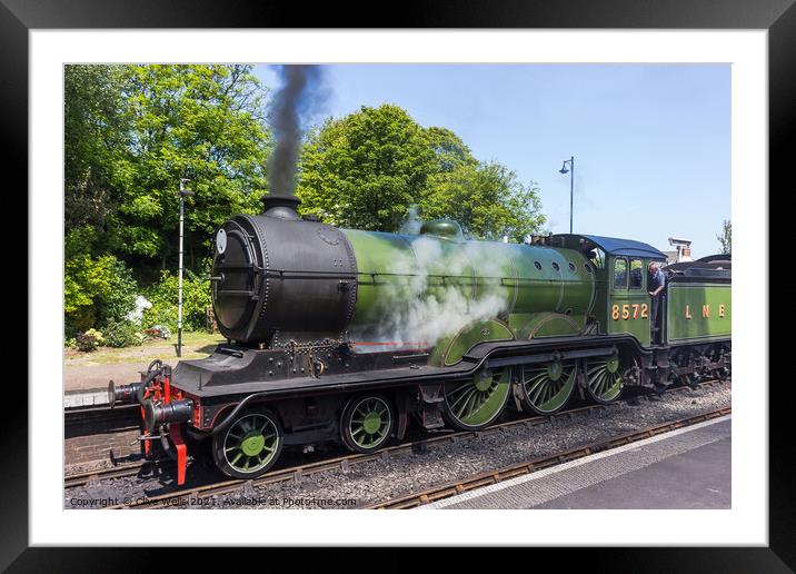 Old steam train fired up and ready to go. Framed Mounted Print by Clive Wells