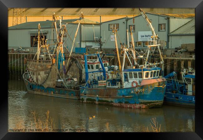 Two fishings boats at low tide Framed Print by Clive Wells