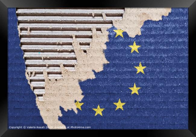 The EU flag on a ripped cardboard. Framed Print by Valerio Rosati