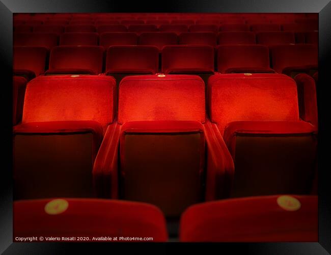 Three empty red velvet armchairs Framed Print by Valerio Rosati