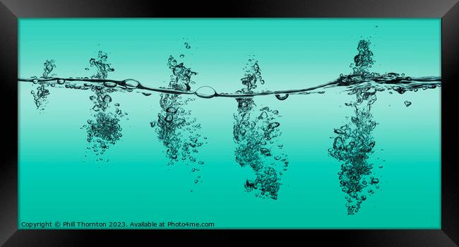A series of bubbles in pastel green water Framed Print by Phill Thornton