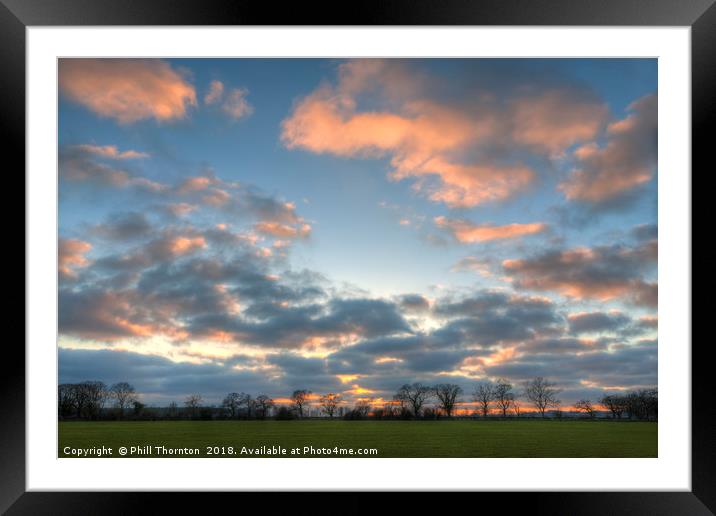 Sunset on a spring evening. Framed Mounted Print by Phill Thornton