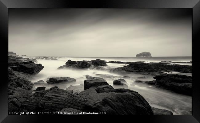 Bass Rock on a stormy day. Framed Print by Phill Thornton