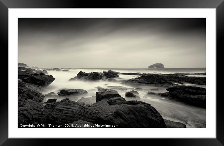 Bass Rock on a stormy day. Framed Mounted Print by Phill Thornton