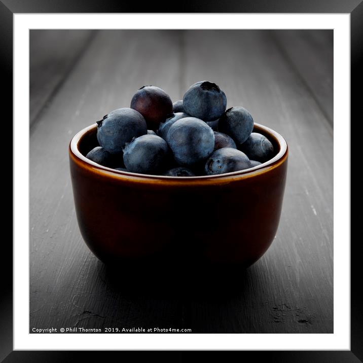 Still life of blueberries in a bowl Framed Mounted Print by Phill Thornton