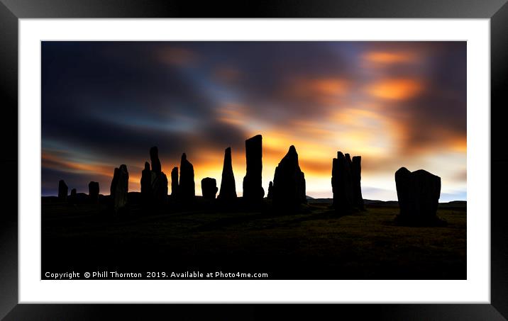 Sunset over the  Callanish Standing Stones Framed Mounted Print by Phill Thornton