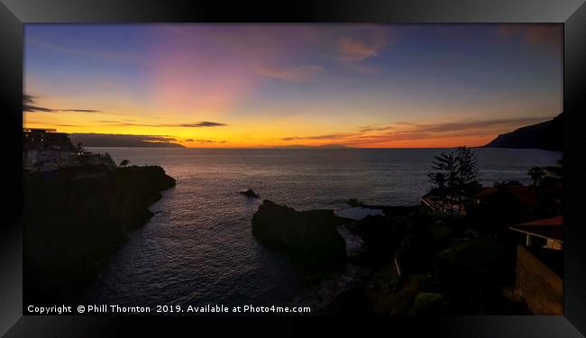 Sunset from the seaside village of Los Gigantes Framed Print by Phill Thornton