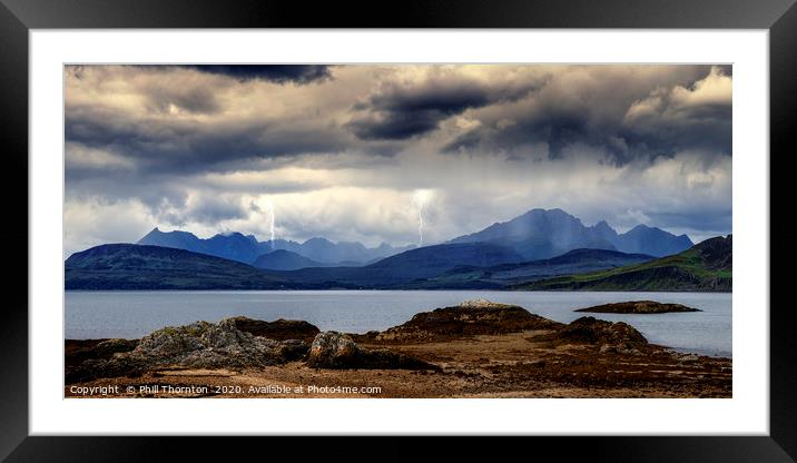 Storm clouds over the  Black & Red Cuillins. Framed Mounted Print by Phill Thornton