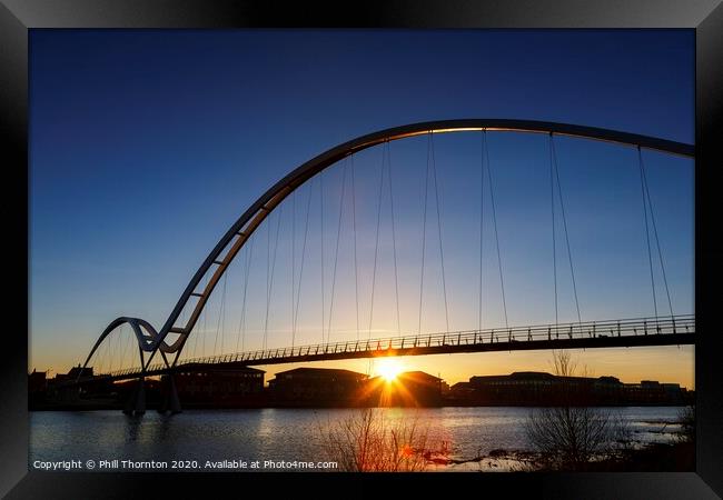 Sunset behind the Infinity Bridge, Stockton-on Tee Framed Print by Phill Thornton