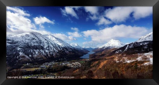 Loch Leven and the village of Kinlochleven. Framed Print by Phill Thornton