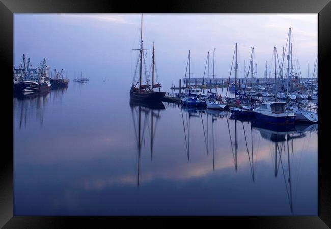 Eerie early morning Brixham harbour Framed Print by Steve Mantell