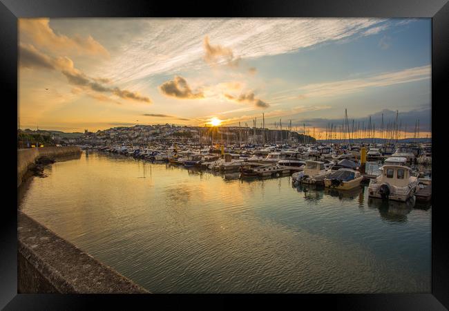 Brixham harbour sunset Framed Print by Steve Mantell