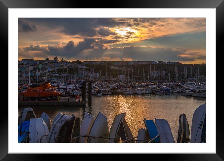 Brixham harbour RNLI lifeboat sunset Framed Mounted Print by Steve Mantell