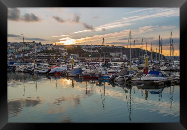 Sunset in Brixham harbour marina Framed Print by Steve Mantell