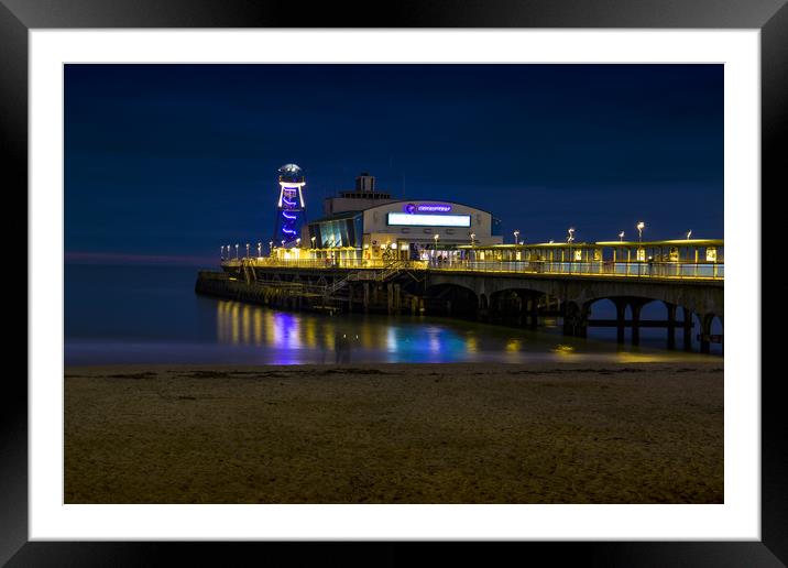 Bournemouth pier at night Framed Mounted Print by Steve Mantell