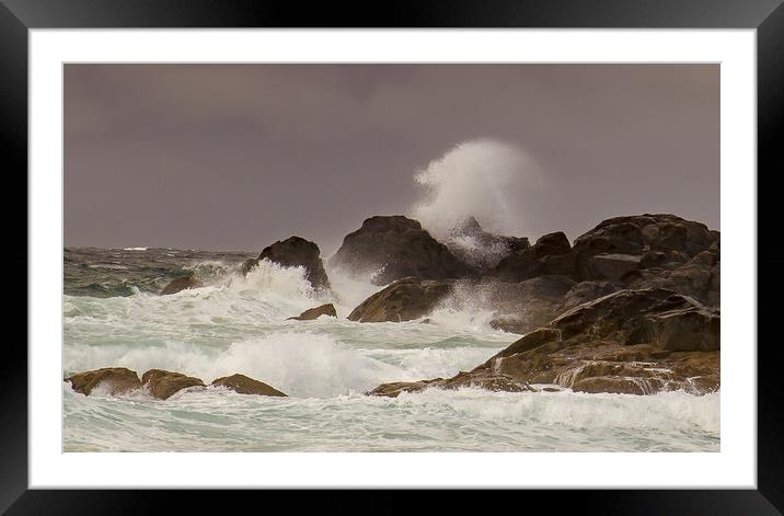 Stormy waves crashing against the rocks Framed Mounted Print by Steve Mantell