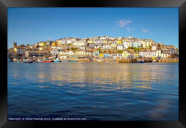 Brixham town houses in early morning sunshine Framed Print by Steve Mantell
