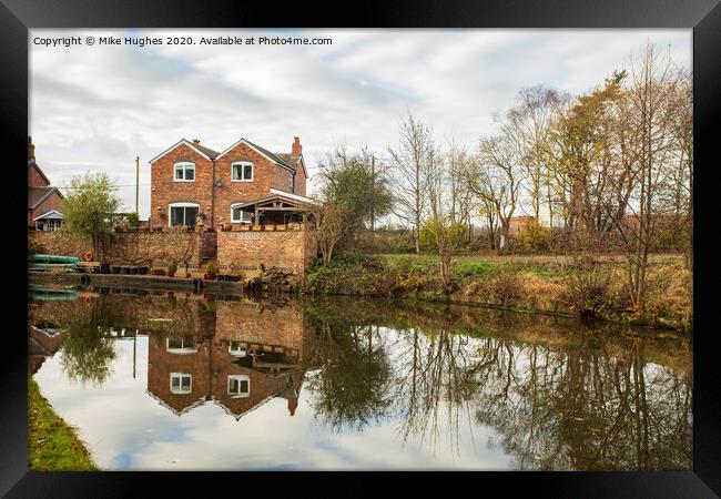 House on Canal side Framed Print by Mike Hughes