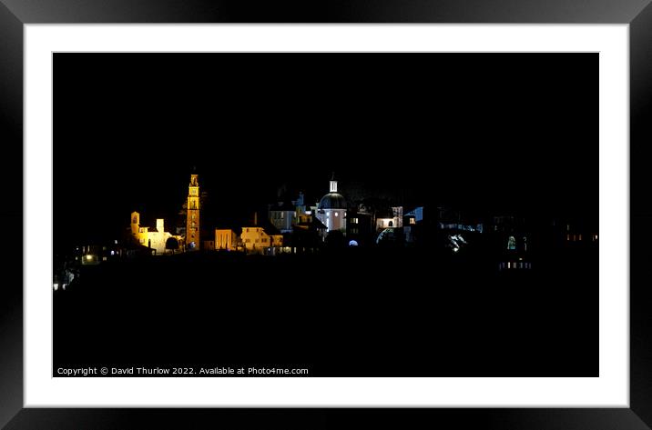 The lights of the Italianate village of Portmeirio Framed Mounted Print by David Thurlow