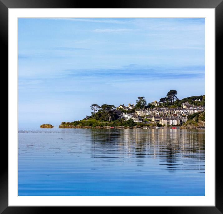 Calm early summer conditions create a pleasing reflection of the village of Borthygest. Framed Mounted Print by David Thurlow