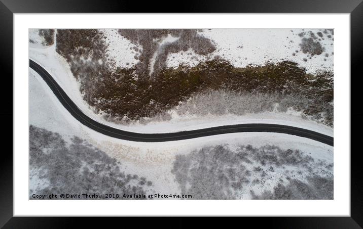 Icelandic Ice Road Framed Mounted Print by David Thurlow