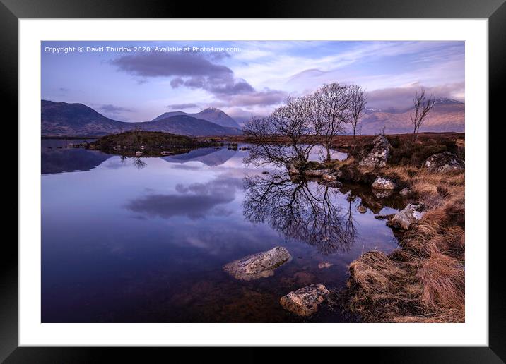 Lochan na h-Achlaise with Black Mount in the background Framed Mounted Print by David Thurlow