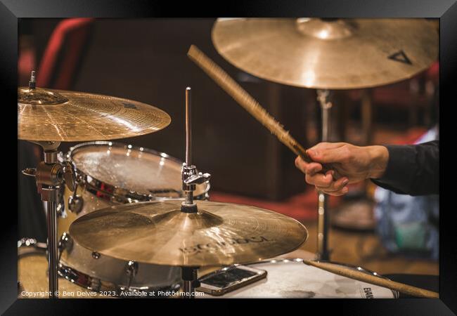 striking the drums and cymbals Framed Print by Ben Delves