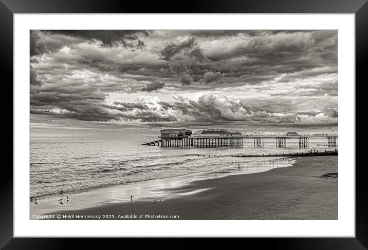 Stormy Clouds over the Pier Framed Mounted Print by Heidi Hennessey